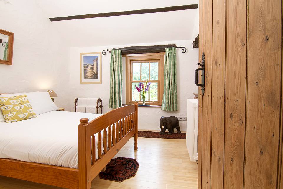 Bedroom with oak framed bed